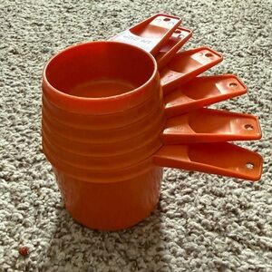 Vintage 1970’s Tupperware Orange Measuring Cups